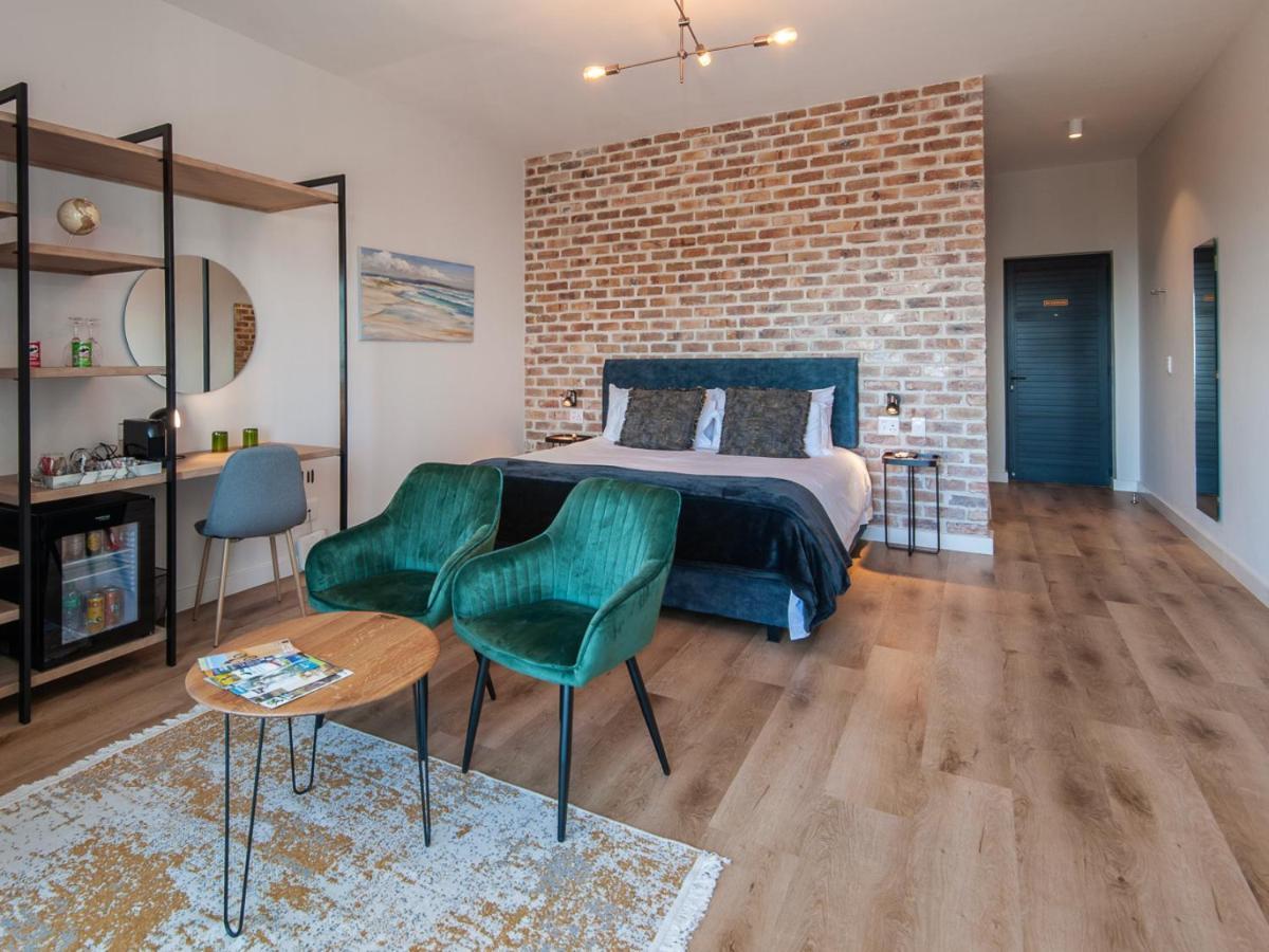 Glow Boutique Suites & Guesthouse Херманус Номер фото