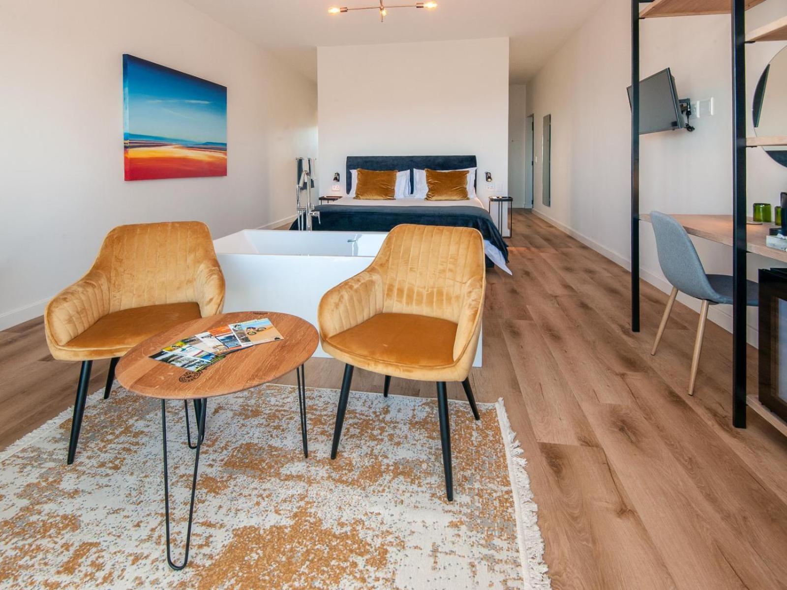 Glow Boutique Suites & Guesthouse Херманус Номер фото